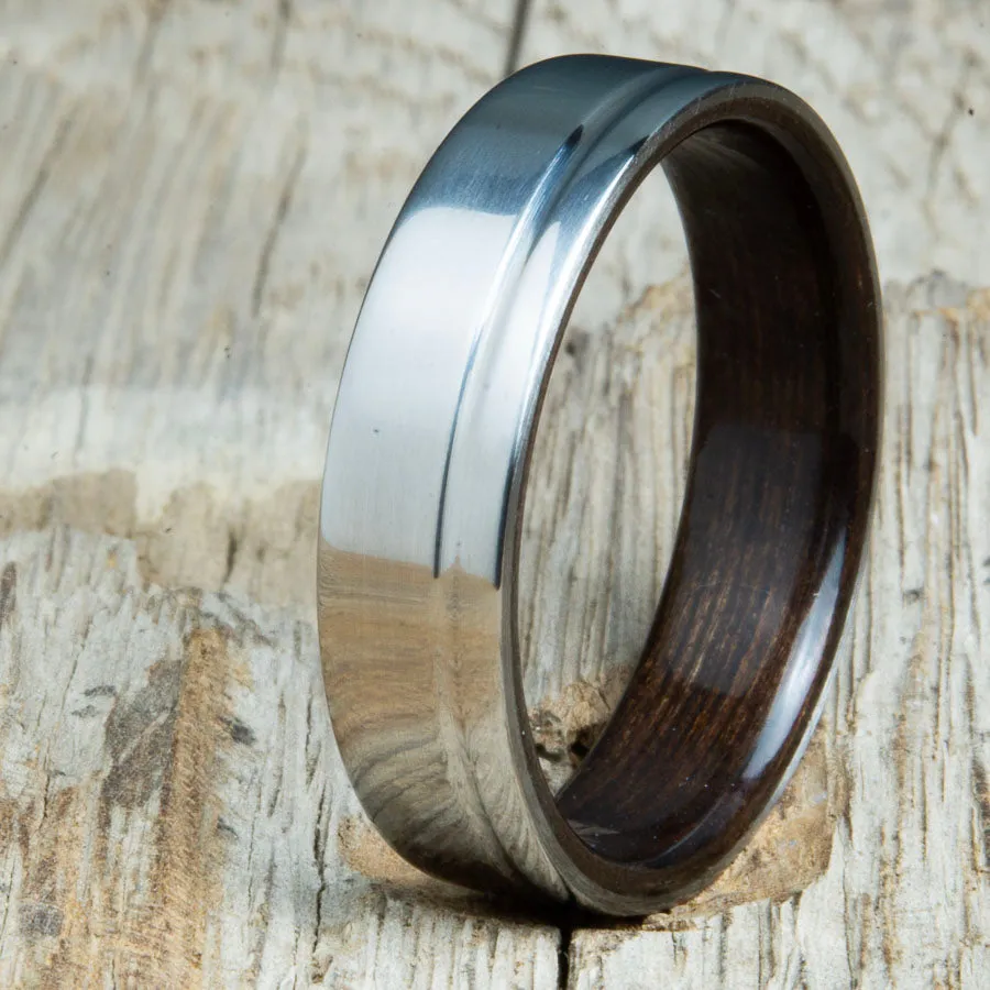 Polished titanium wedding band with Ebony interior